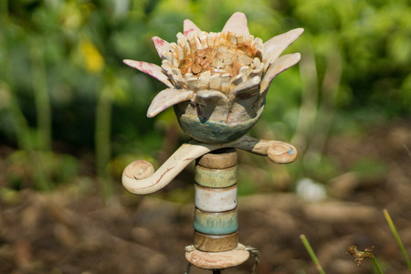 A colorful stele as art in the yarden with unsharp background Positioned in the middle.の写真素材