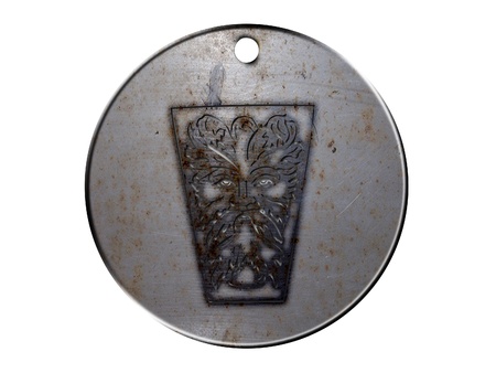 3d monster mythology, in metal medallion on a white isolated background の写真素材