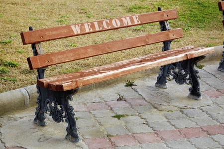 A wooden park bench.