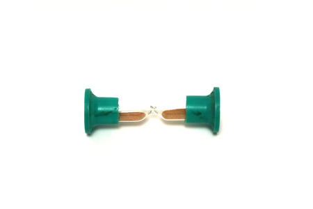 Old green hourglass on white background