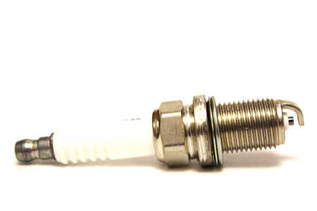 New spark plugs on a white background