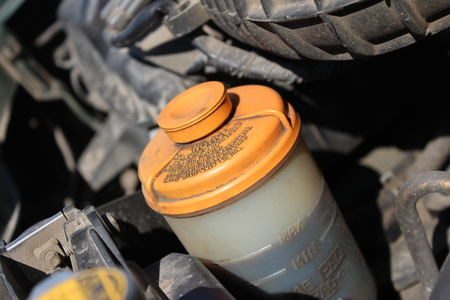 The tank of power steering in the carの写真素材