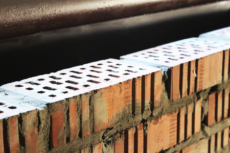 The brick wall in the garage
