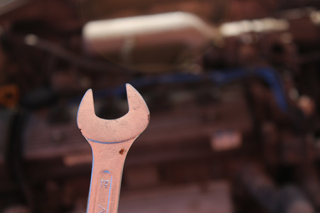 Wrench on the background of a car engineの写真素材