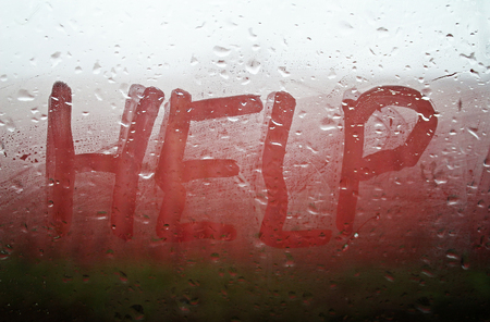 The "Help" inscription on the sweaty glassの写真素材