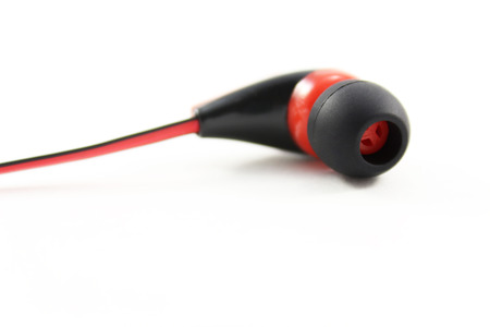 Red headphones on white backgroundの写真素材