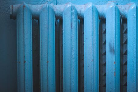 Old shabby radiator of blue colorの写真素材