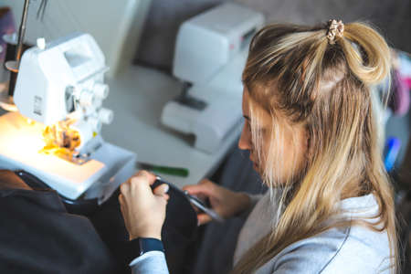 The seamstress at work in the studioの写真素材