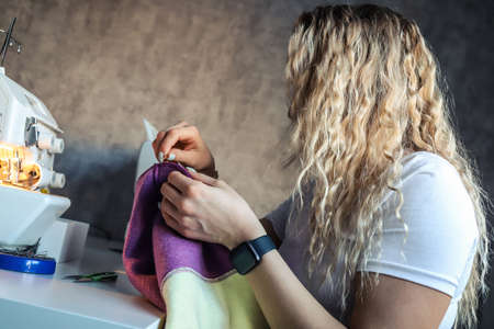 The seamstress at work in the studioの写真素材