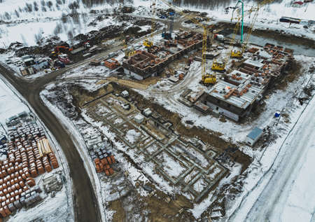 The foundation of a residential building. view from above. construction background. snow winterの写真素材