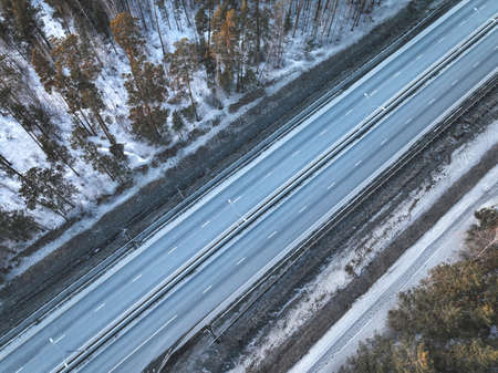 highway in the forest. aerial view. empty roadの写真素材