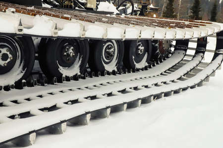 Detail of snowcat crawler close-up. Winter, snow, outdoorsの写真素材