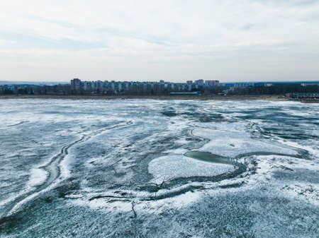 frozen river. Icy snowy background. air viewの写真素材