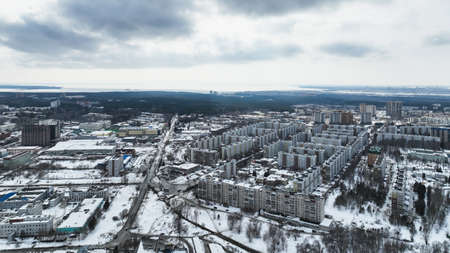 Cityscape of a small town in winter. Aerial viewの写真素材