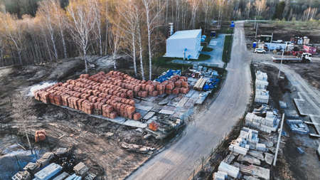 Pallets of bricks for construction. outdoor storage. Warehousing of large quantities of minerals....