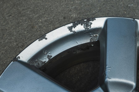 Corrosion on a silver aluminum alloy wheel close-upの写真素材