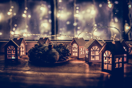 New Year's illuminated toys - houses. Christmas background. Garlandの写真素材