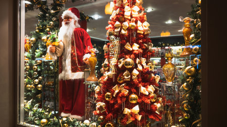 Christmas shop window with Santa Claus and Christmas treeの写真素材