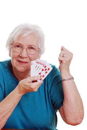 senior woman playing pokerの写真素材