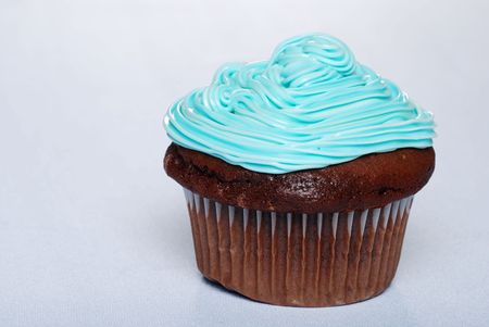 chocolate cupcake with blue frostingの写真素材