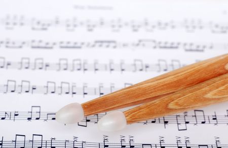 drum sticks on sheet musicの写真素材