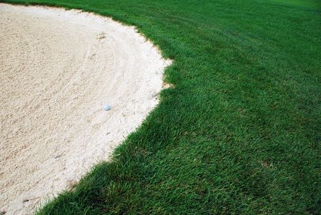 Golf Ball the sand trapの写真素材