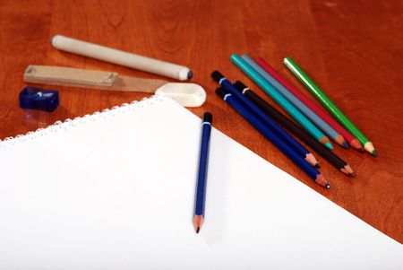 Art supplies focus on centre pencil