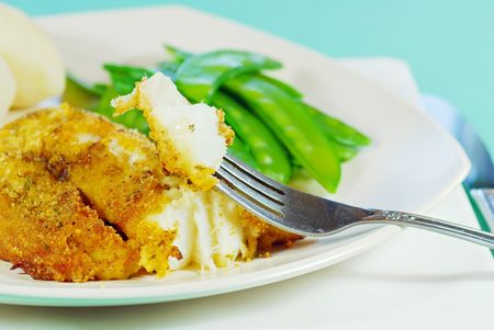  Fresh cod on a forkの写真素材
