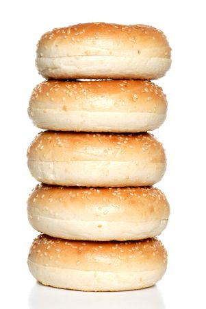  Isolated stack of fresh sesame seed bagels