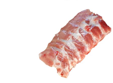 Raw spare ribs on white backgroundの写真素材