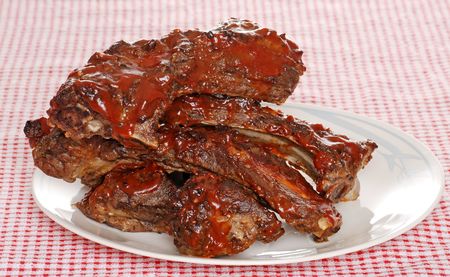 Stack of barbecue beef spare ribs with sauceの写真素材
