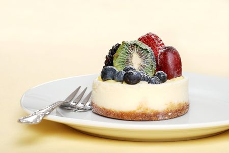 fruit cheesecake with a forkの写真素材