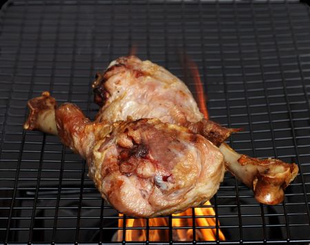 smoked turkey legs on the barbecueの写真素材