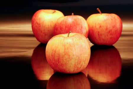 lots of apples on blackの写真素材