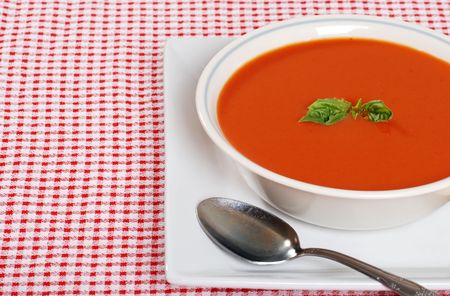 fresh tomato soup with basilの写真素材