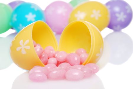 spilling pink jelly beans shallow DOFの写真素材