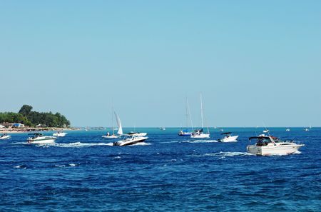 boating in a busy lakeの写真素材