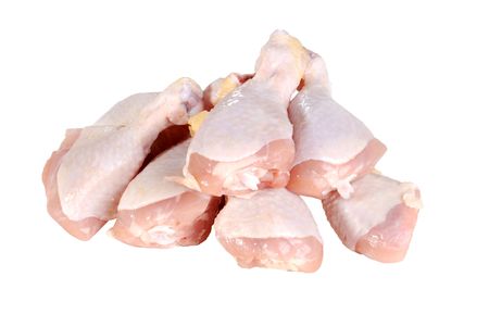 isolated pile of chicken drumsticksの写真素材