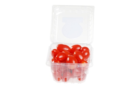 cherry tomatoes in a plastic containerの写真素材