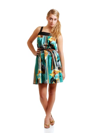 blond teenager posing in a summer dressの写真素材