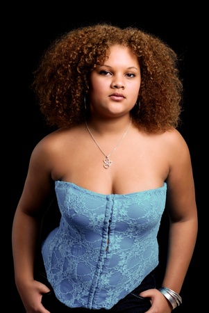 young black woman wearing a blue corset and necklaceの写真素材