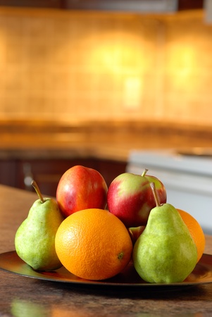 Fruit on a wooden plateの写真素材