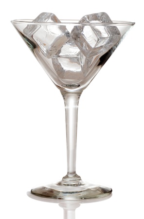 Martini glass with ice cubesの写真素材