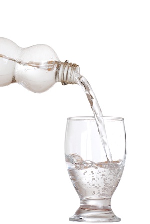 Pouring water into glassの写真素材