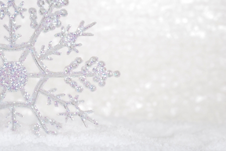 Glitter Snowflake in snowの写真素材