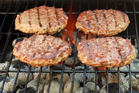 hamburgers on the grillの写真素材