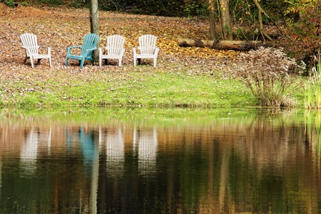 four chairs by the lakeの写真素材