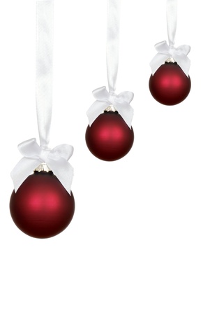 three red christmas ornamentsの写真素材
