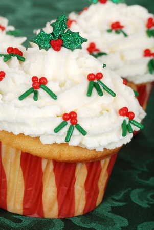 closeup of christmas holly cupcakeの写真素材