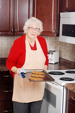 senior woman christmas bakingの写真素材